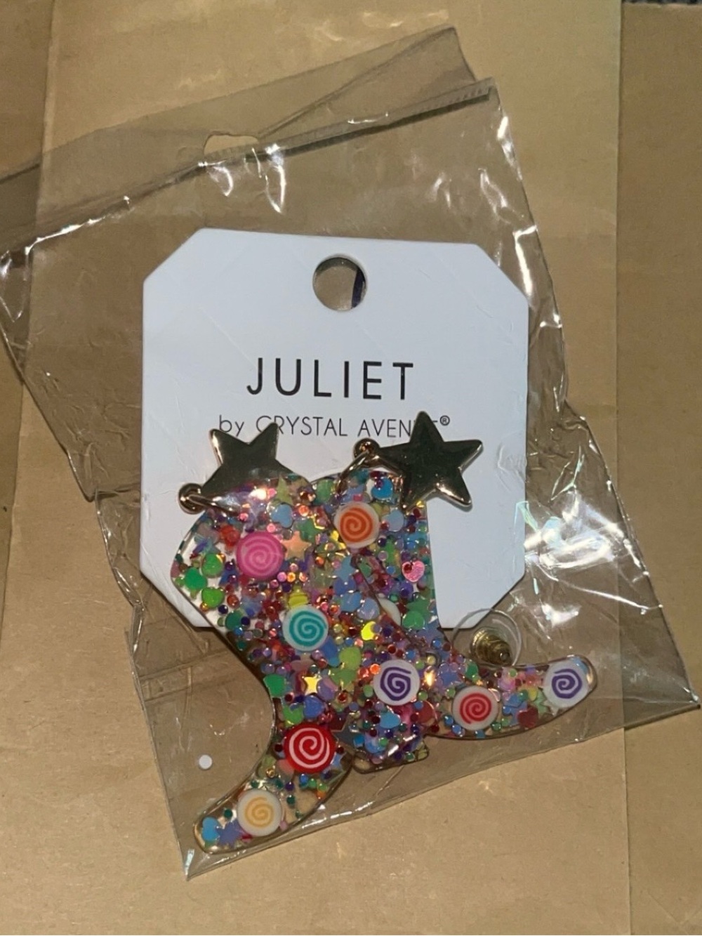 Juliet in vibrant multicolor Cowgirl boots earring’s with playful candy and star